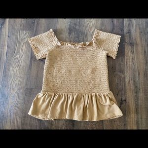 Smocked peplum top